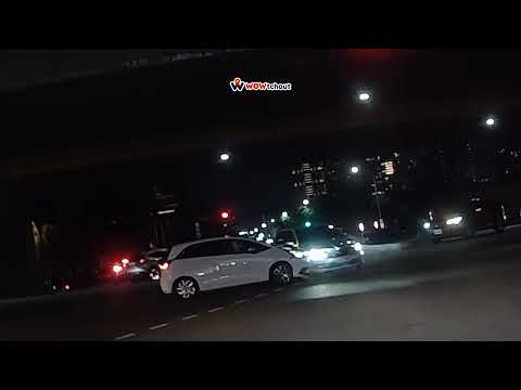 三寶.車禍影片車禍影片 畫面左側的慢車道南向白色自小客車，疑似想利用紅燈左轉燈號，違規直行搶入環中路內側車道（ 04 06 台中市西屯區朝馬路與環中路三段口